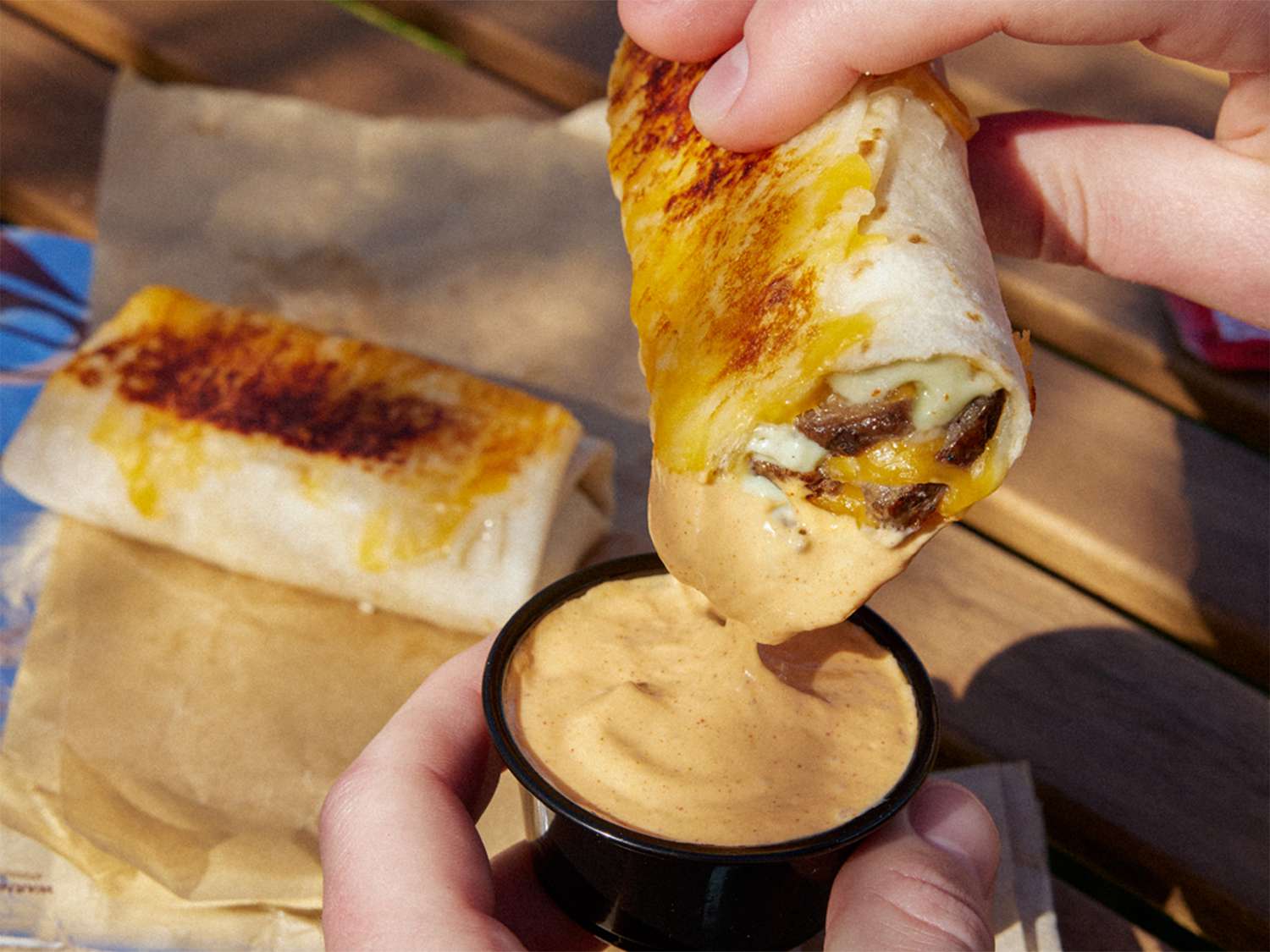 Taco Bell Has a Cheesy New Menu Item We’re Running to the Drive-Thru To Try