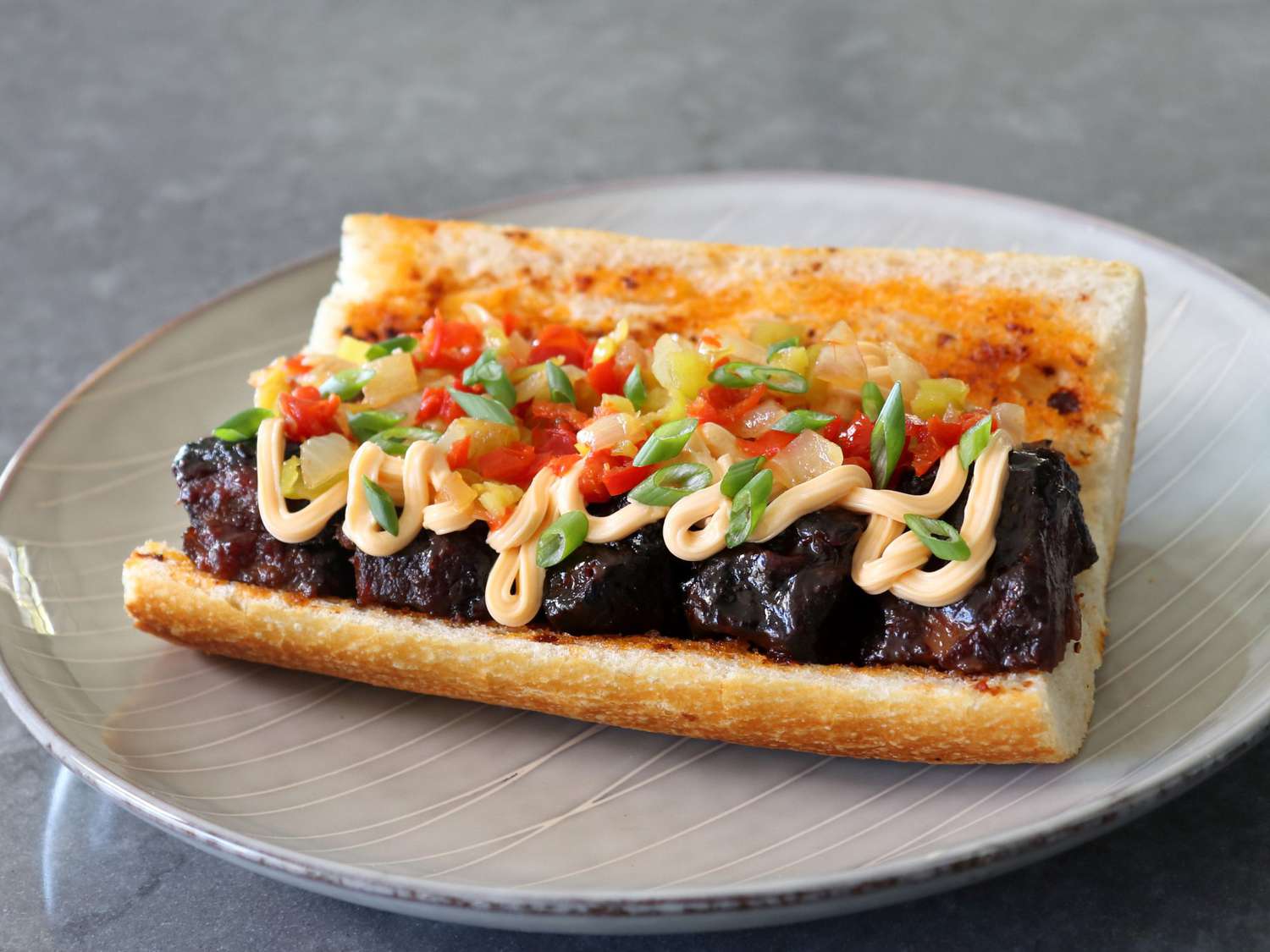 This Kansas City Twist on the Classic Philly Cheesesteak Is Perfect for This Year's Super Bowl