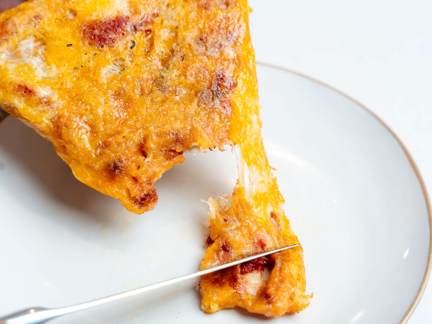 I Just Learned the Most Genius Trick for Reheating Pizza