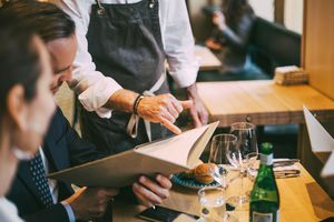 The Best Way to Split a Restaurant Check, According to Etiquette Experts